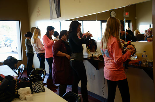 Students styling hair
